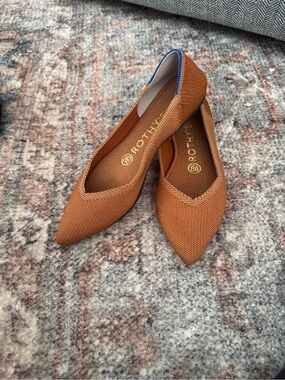 Rothy’s Pointed Knit Flat in Rust with Blue Trim